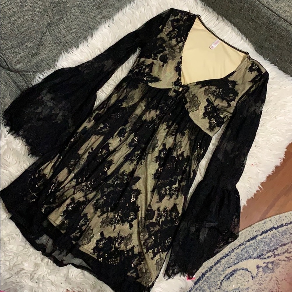 Lace black dress with cream colored lining inside